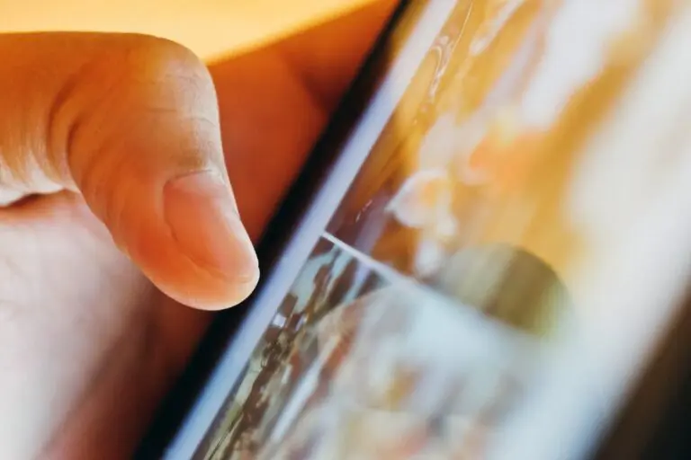 finger-tapping-on-a-mobile-device-screen-2026-03-20-04-51-26-utc.jpeg